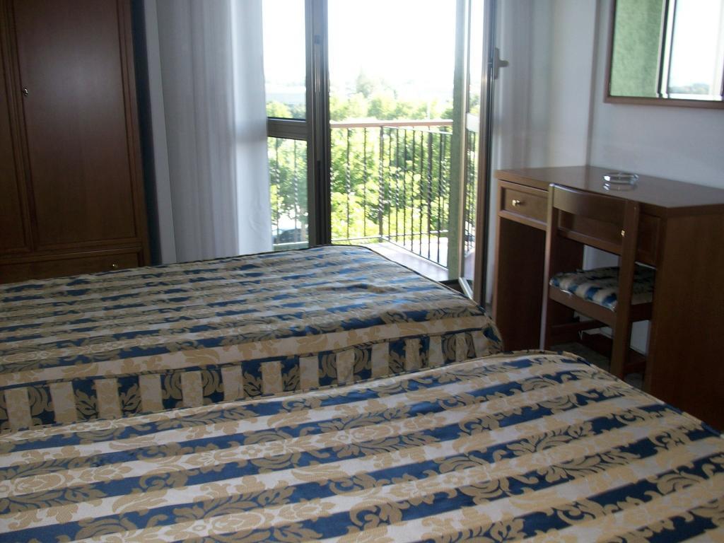 Hotel Santorotto Di Fabio Terrosi Сіналунґа Номер фото