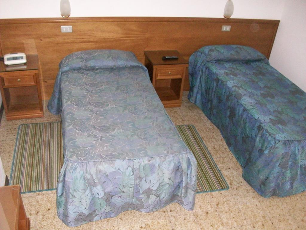 Hotel Santorotto Di Fabio Terrosi Сіналунґа Номер фото