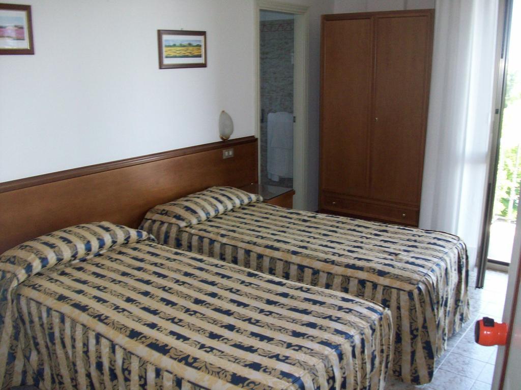 Hotel Santorotto Di Fabio Terrosi Сіналунґа Номер фото